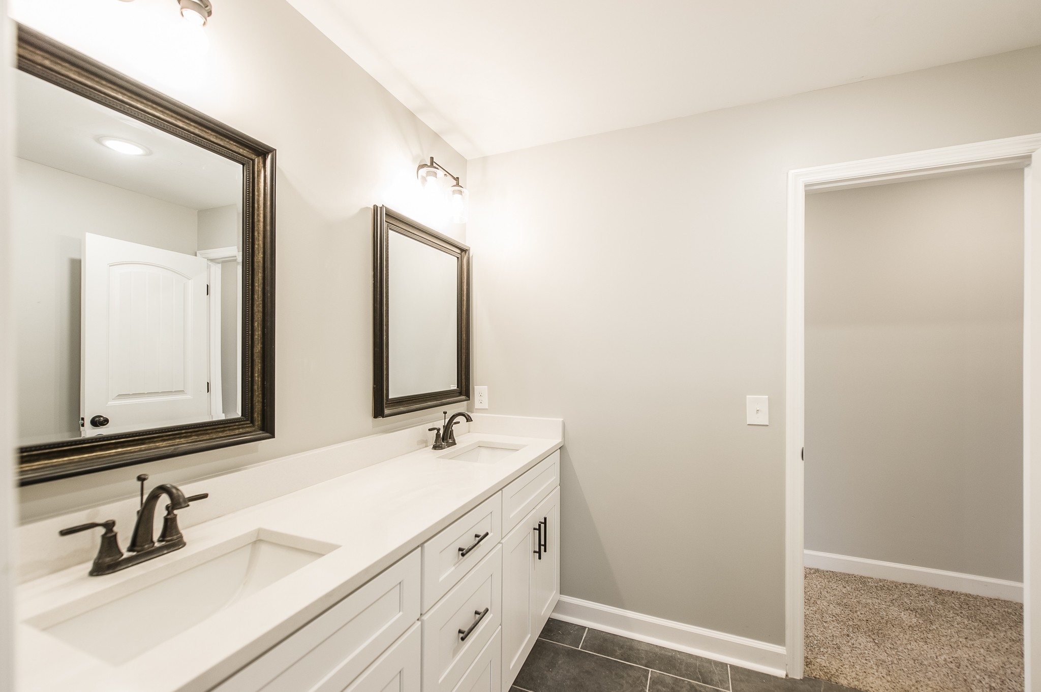815 West Spring Street Lebanon, TN 37087 - Photo 16 of 32 a bathroom with a double vanity sink mirror and