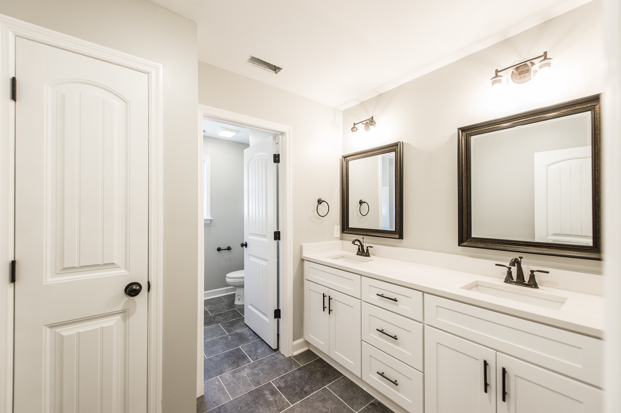 815 West Spring Street Lebanon, TN 37087 - Photo 18 of 32 a spacious bathroom with a double vanity sink mirror and