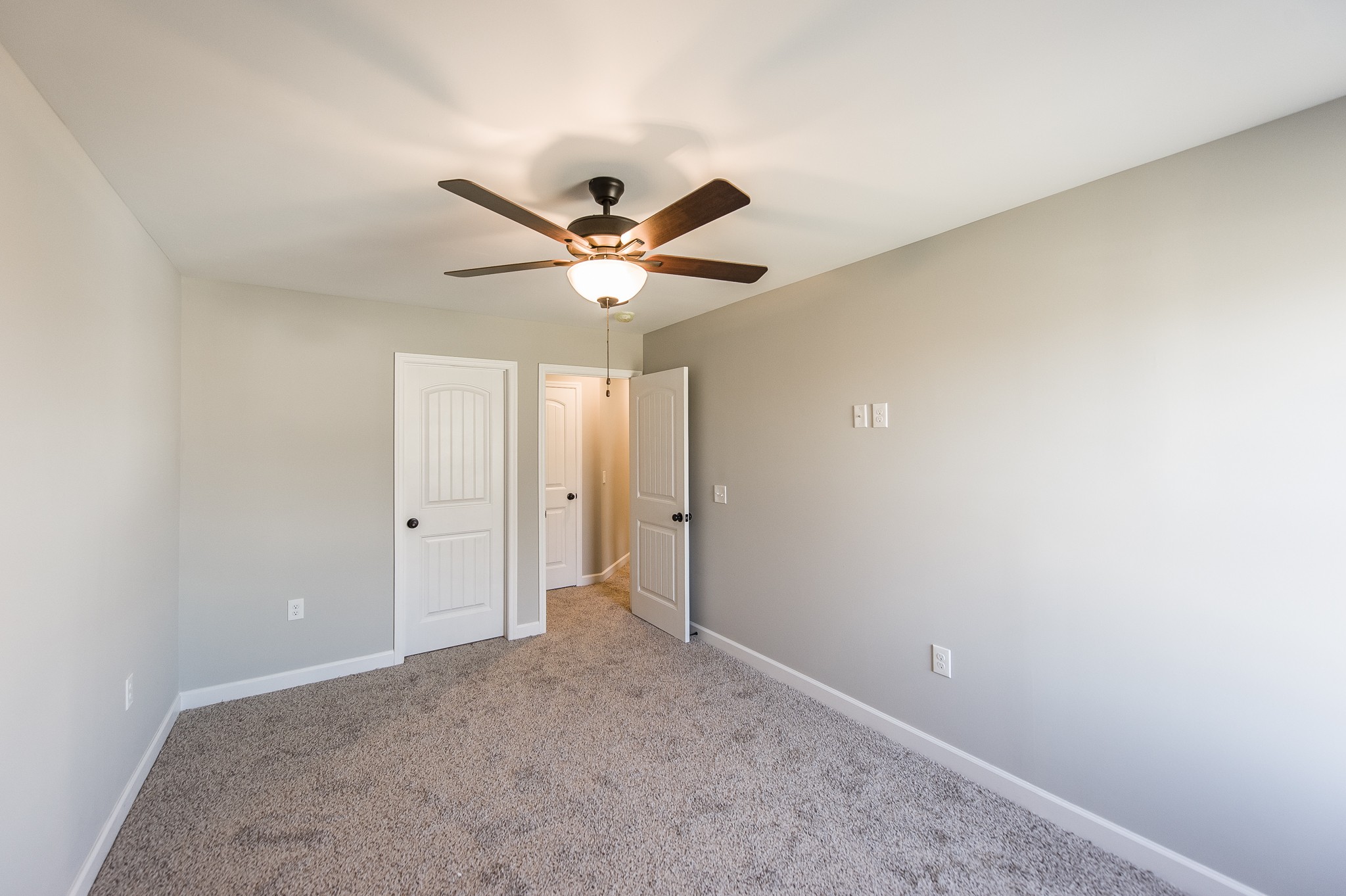 815 West Spring Street Lebanon, TN 37087 - Photo 24 of 32 an empty room with a window and a fan