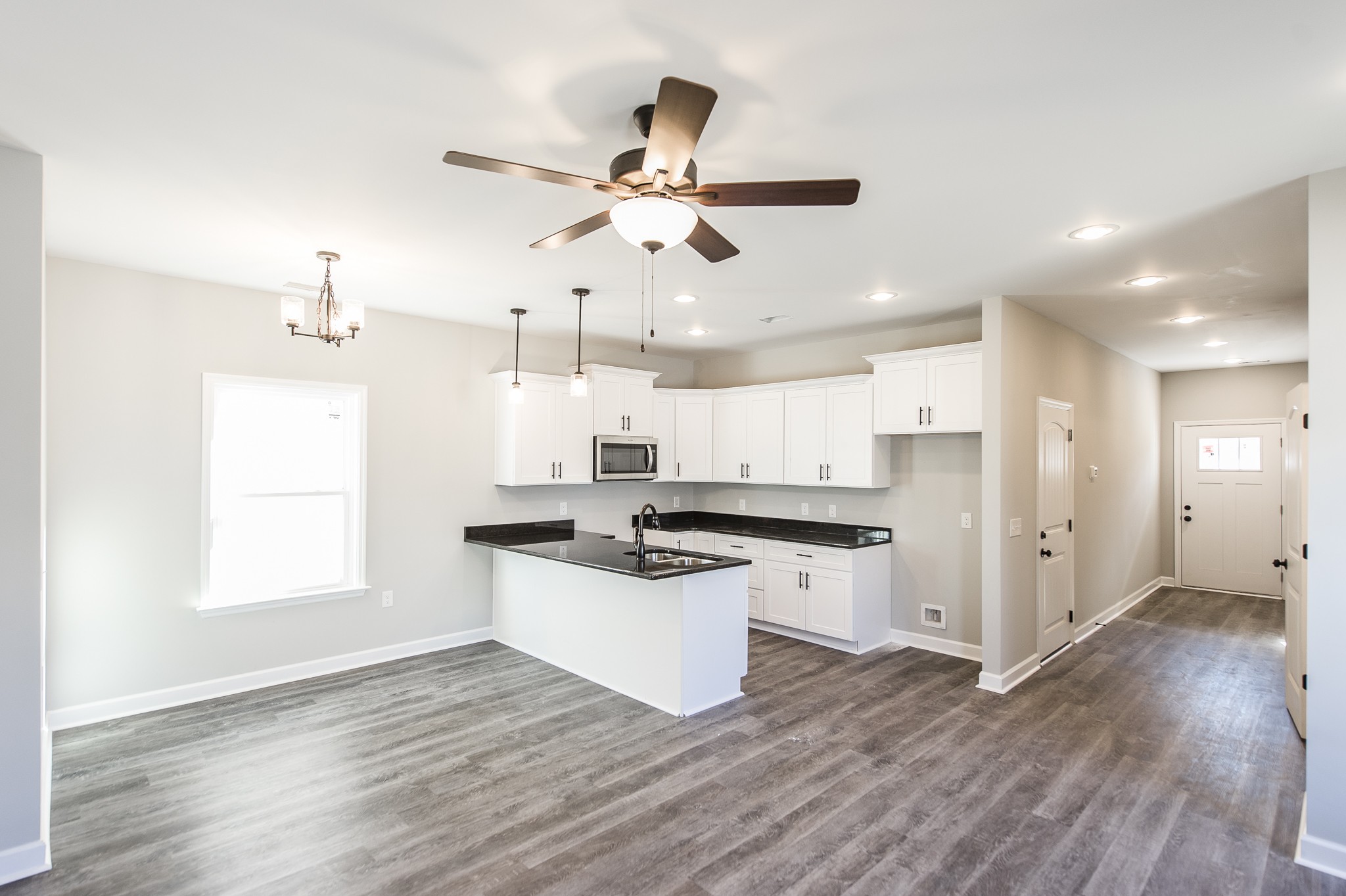815 West Spring Street Lebanon, TN 37087 - Photo 10 of 32 a kitchen with stainless steel appliances a white stove top oven and a refrigerator