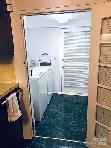 a bedroom with a bed and furniture