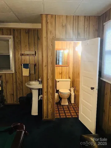 a view of balcony with furniture