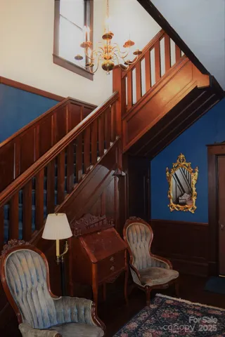 a front view of a house with furniture