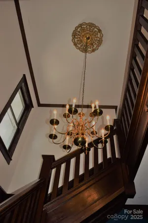 a view of an chairs and table on the wall