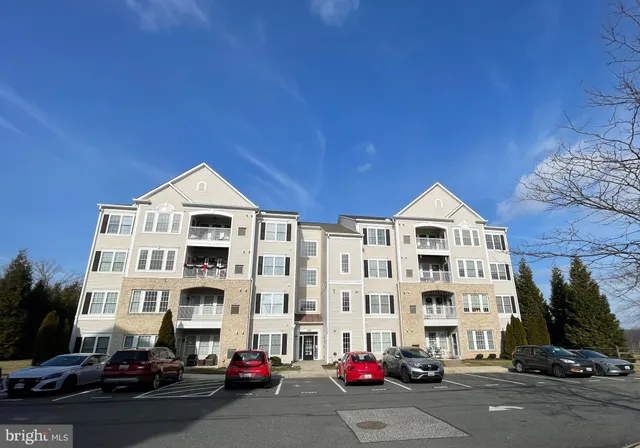 a view of a street with cars