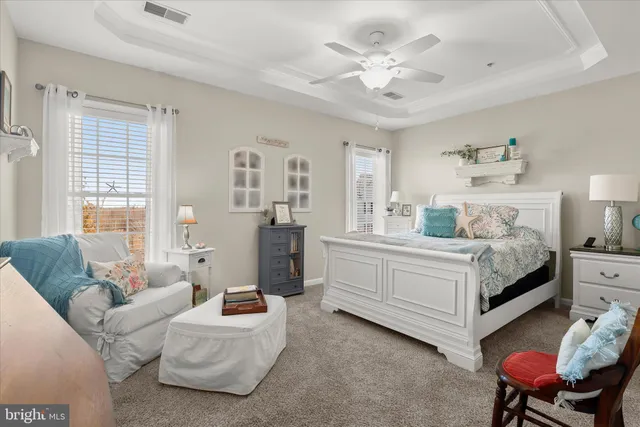 a bathroom with a sink a mirror and a shower