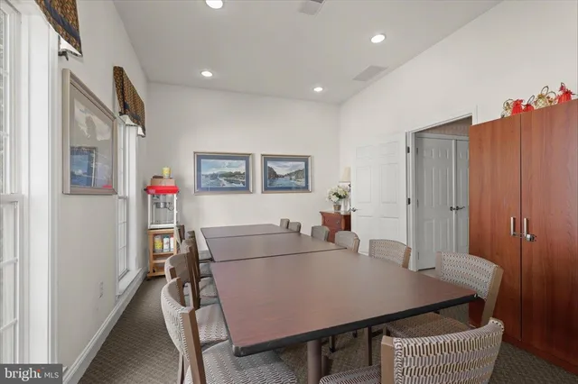 a view of a house with backyard and porch