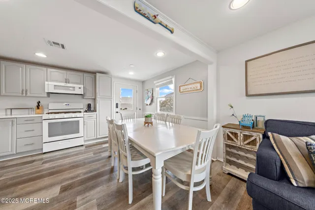 a bedroom with a bed and ceiling fan
