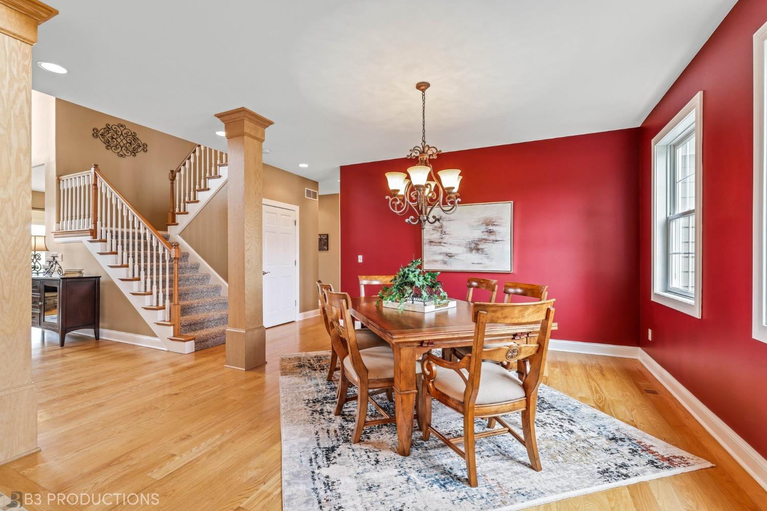 1825 Bramble Trace Chesterton, IN 46304 - Photo 11 of 30 a view of a dining room with furniture a rug and wooden floor
