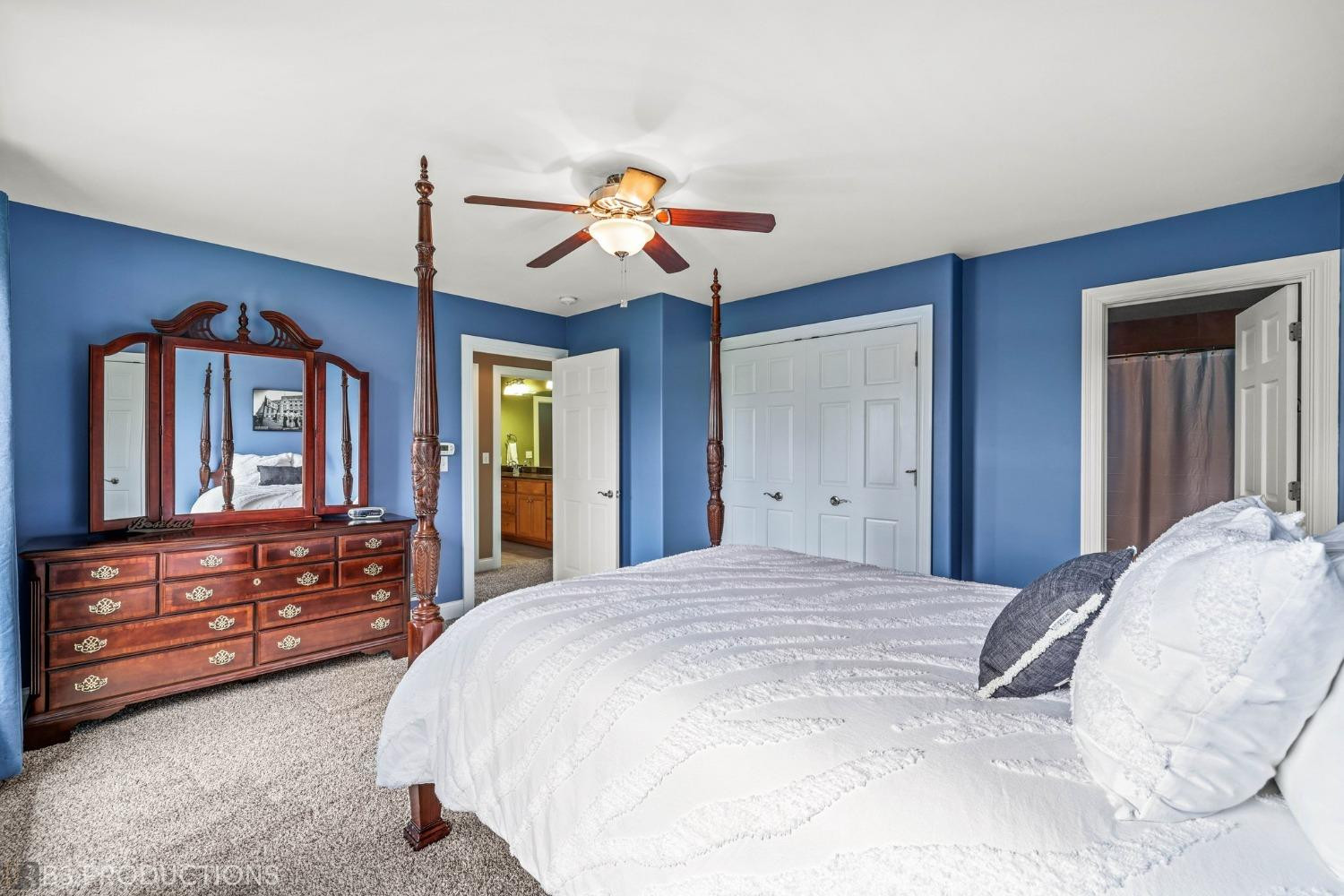 1825 Bramble Trace Chesterton, IN 46304 - Photo 19 of 30 a bedroom with a bed and a dresser
