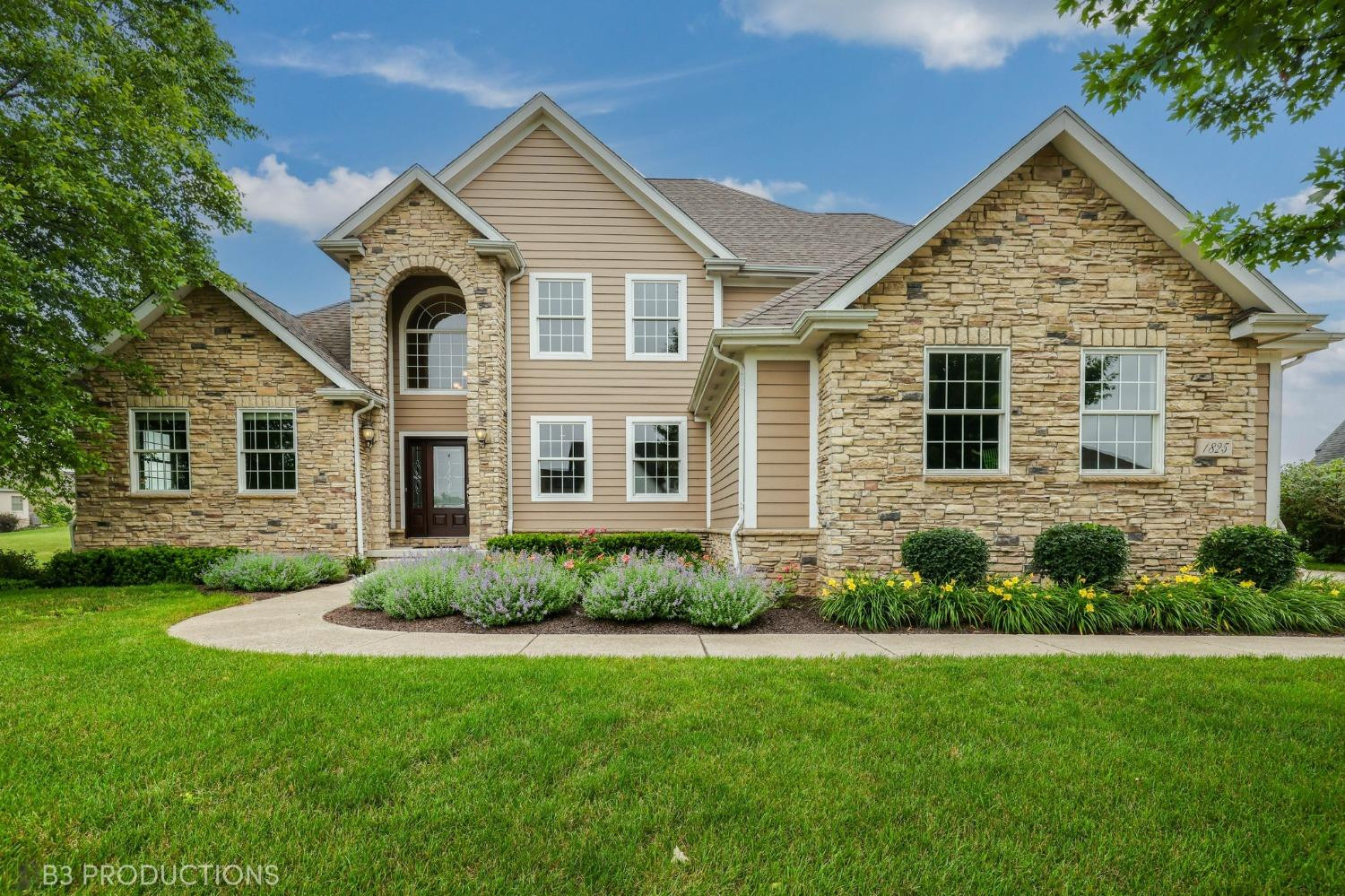 1825 Bramble Trace Chesterton, IN 46304 - Photo 2 of 30 a view of a house with a yard
