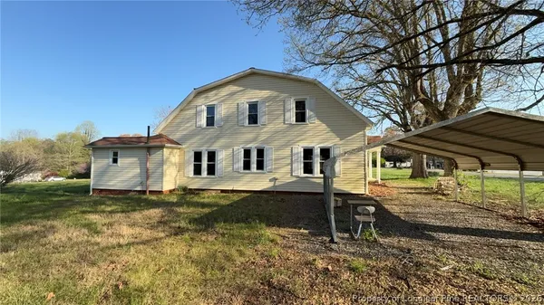 a view of backyard with green space