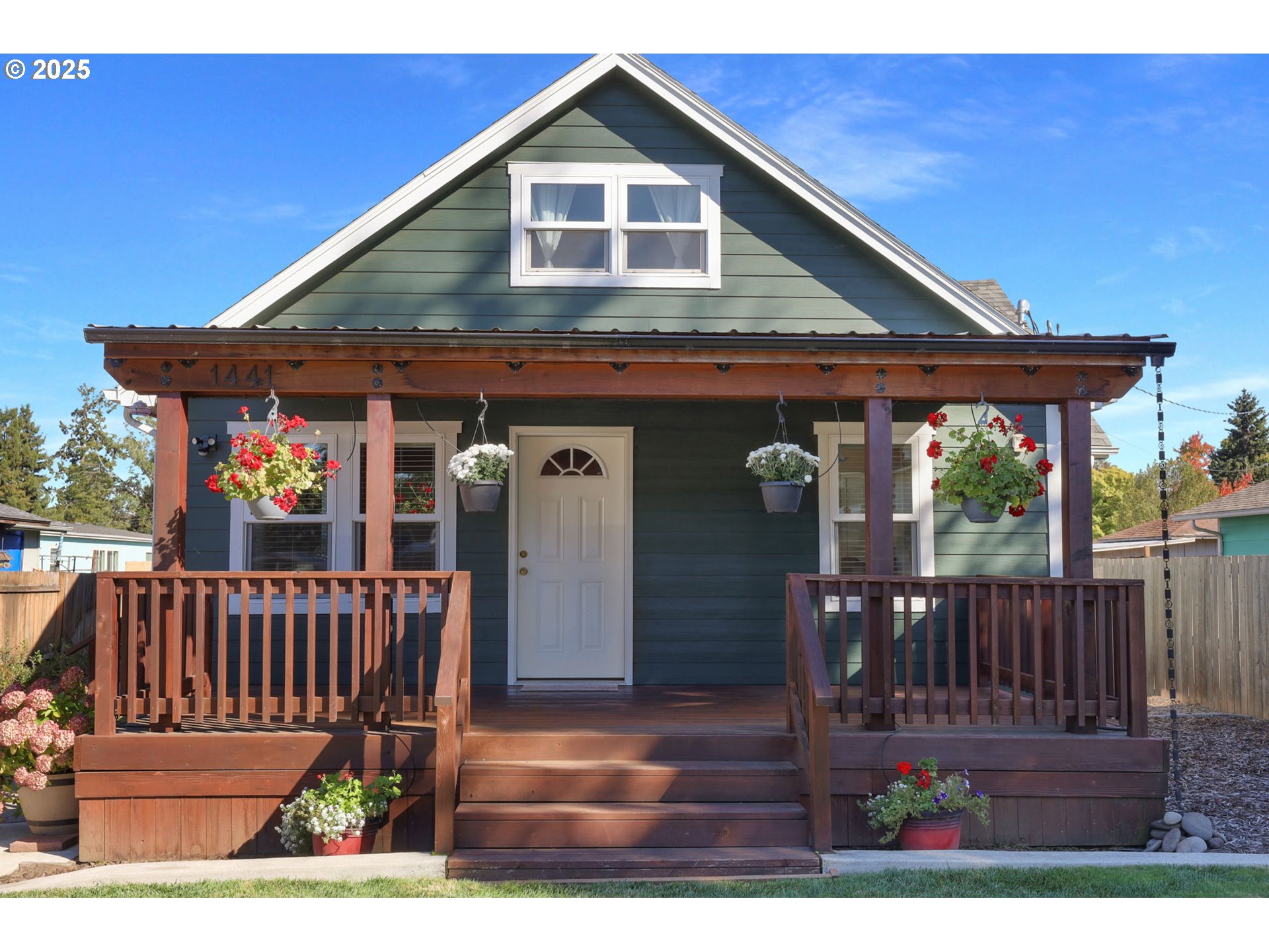 1441 6th Street Springfield, OR 97477 - Photo 1 of 48 a front view of house with deck and furniture