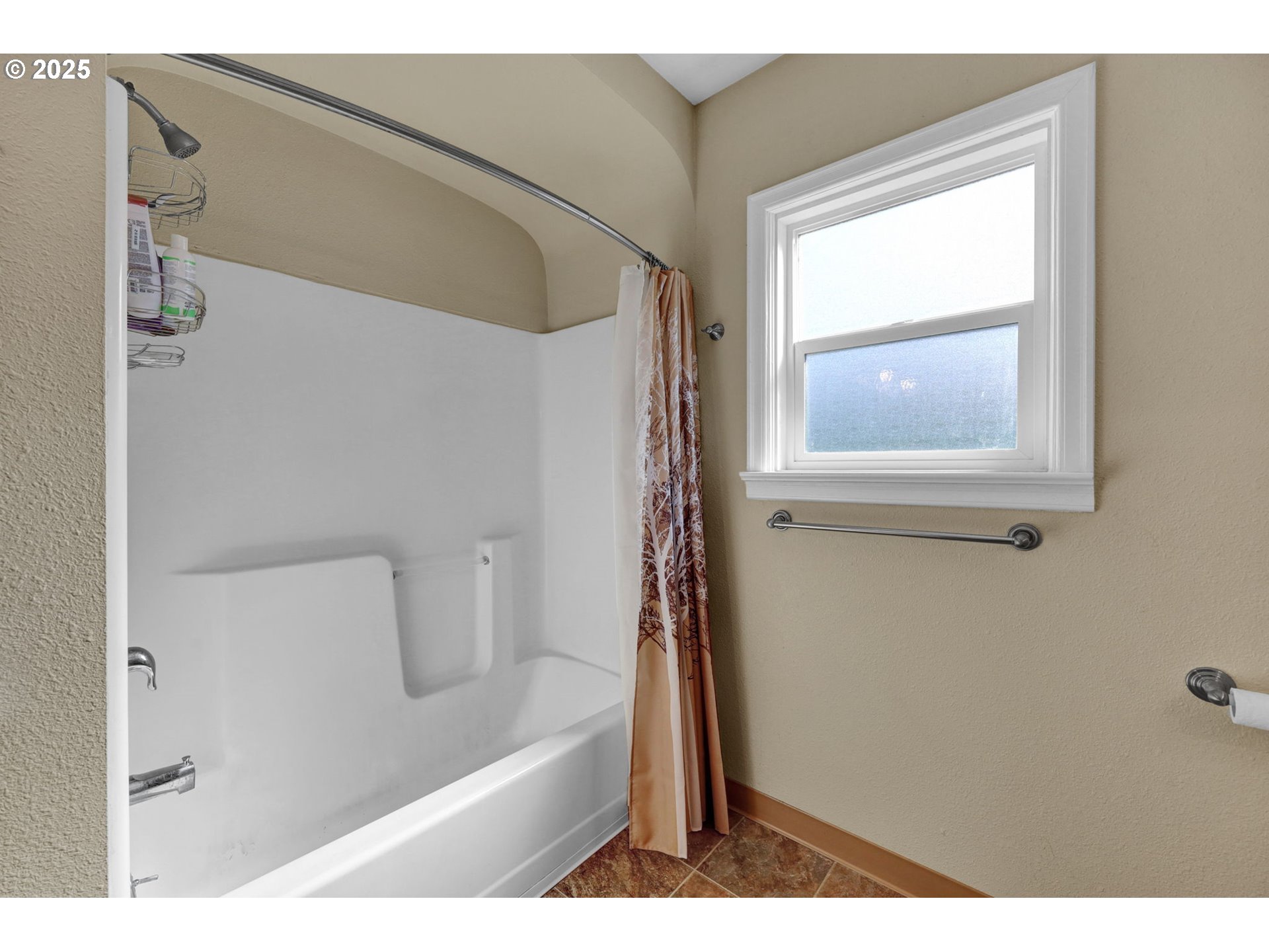 1441 6th Street Springfield, OR 97477 - Photo 22 of 48 a bathroom with a bathtub and shower