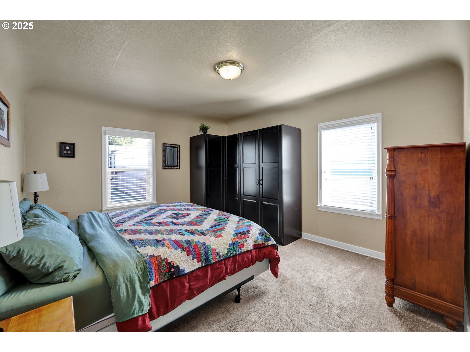 1441 6th Street Springfield, OR 97477 - Photo 23 of 48 a bedroom with a bed and a window
