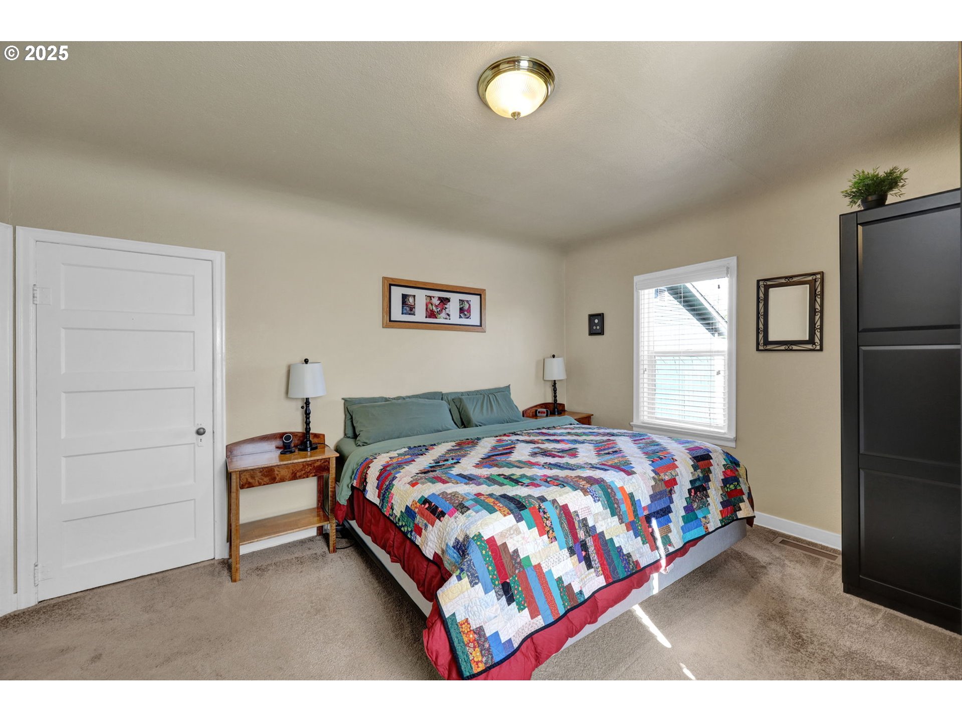 1441 6th Street Springfield, OR 97477 - Photo 24 of 48 a bedroom with a bed and a cabinets