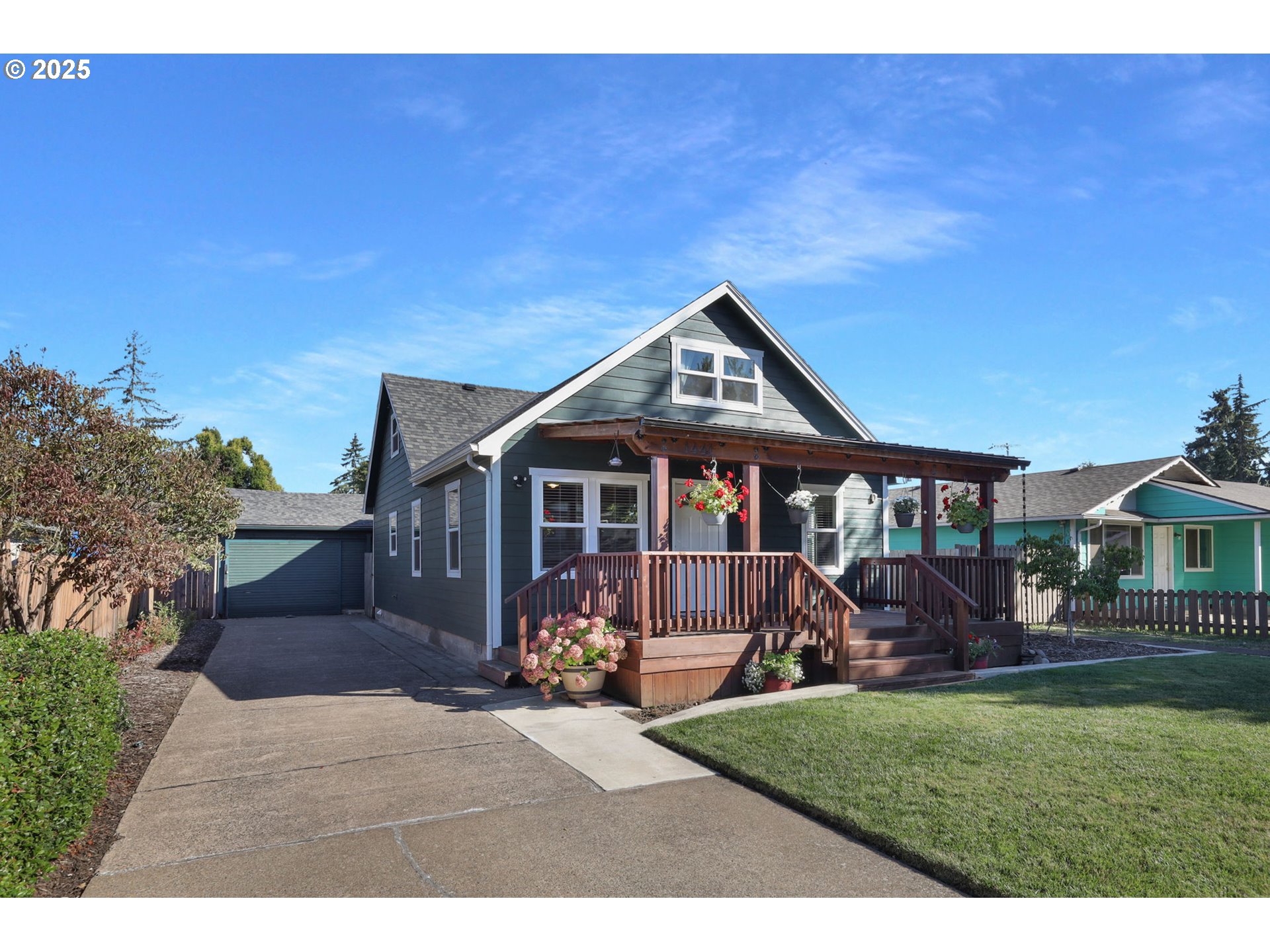1441 6th Street Springfield, OR 97477 - Photo 3 of 48 a front view of a house with a yard