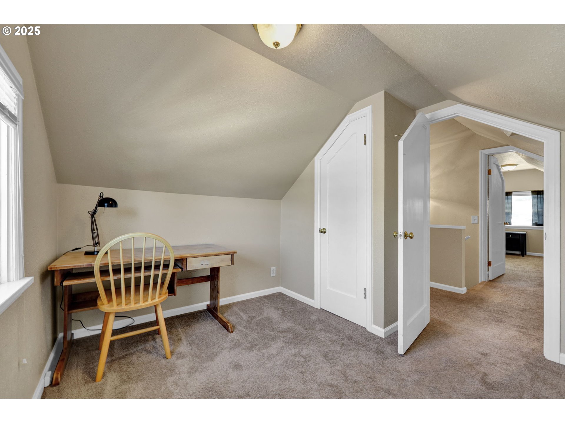 1441 6th Street Springfield, OR 97477 - Photo 32 of 48 a living room with a table and chairs