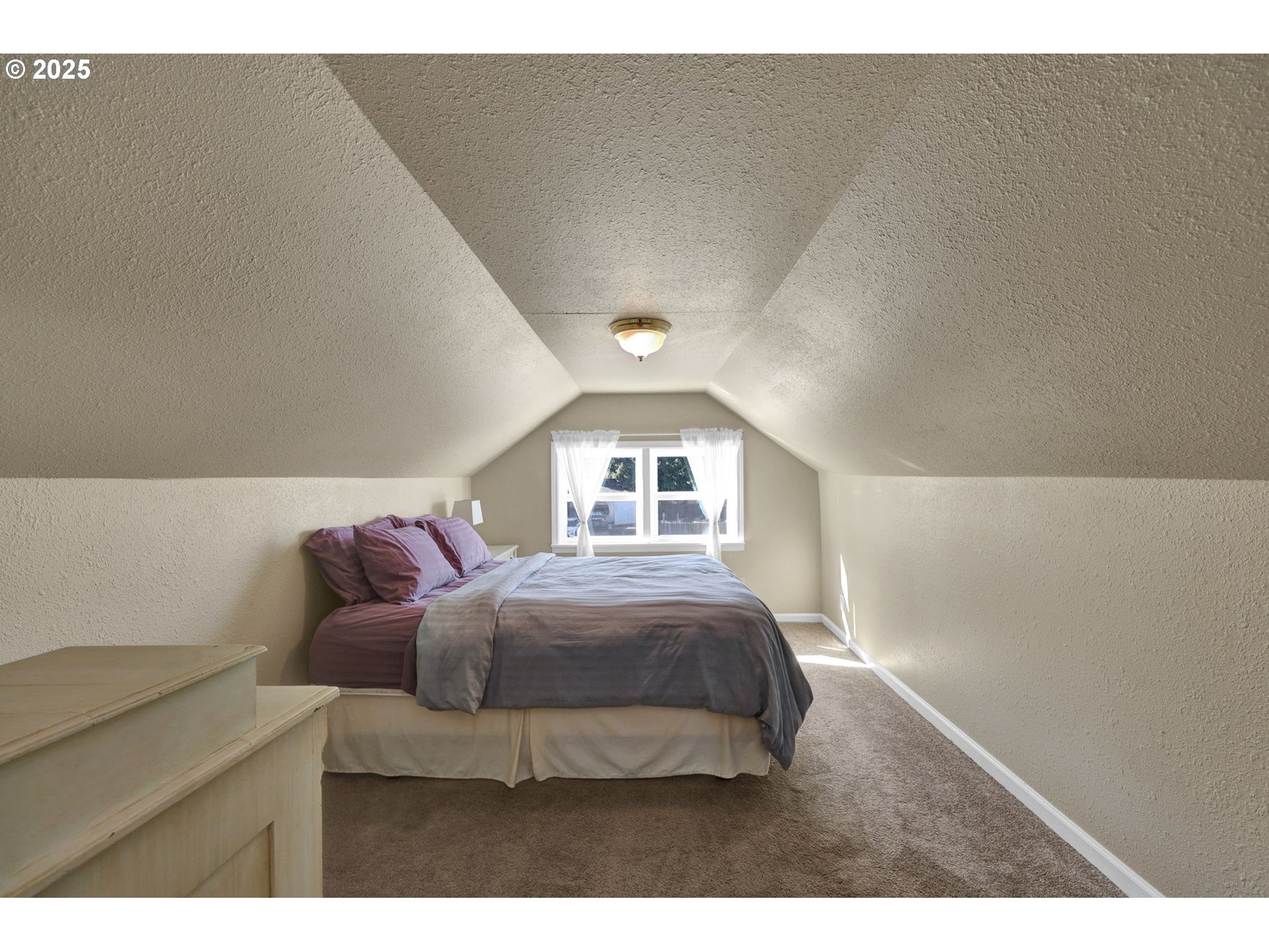 1441 6th Street Springfield, OR 97477 - Photo 33 of 48 a bedroom with a bed and a window