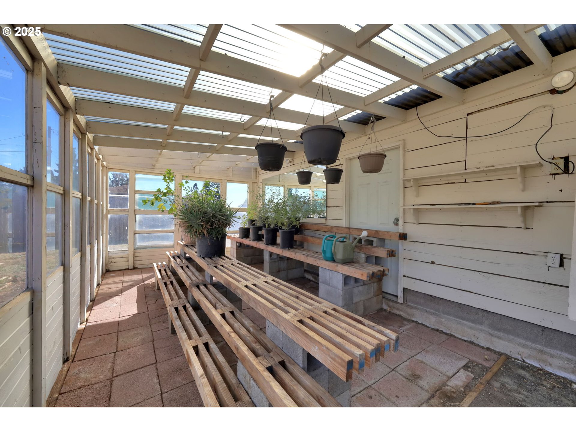 1441 6th Street Springfield, OR 97477 - Photo 43 of 48 a view of a porch with wooden floor