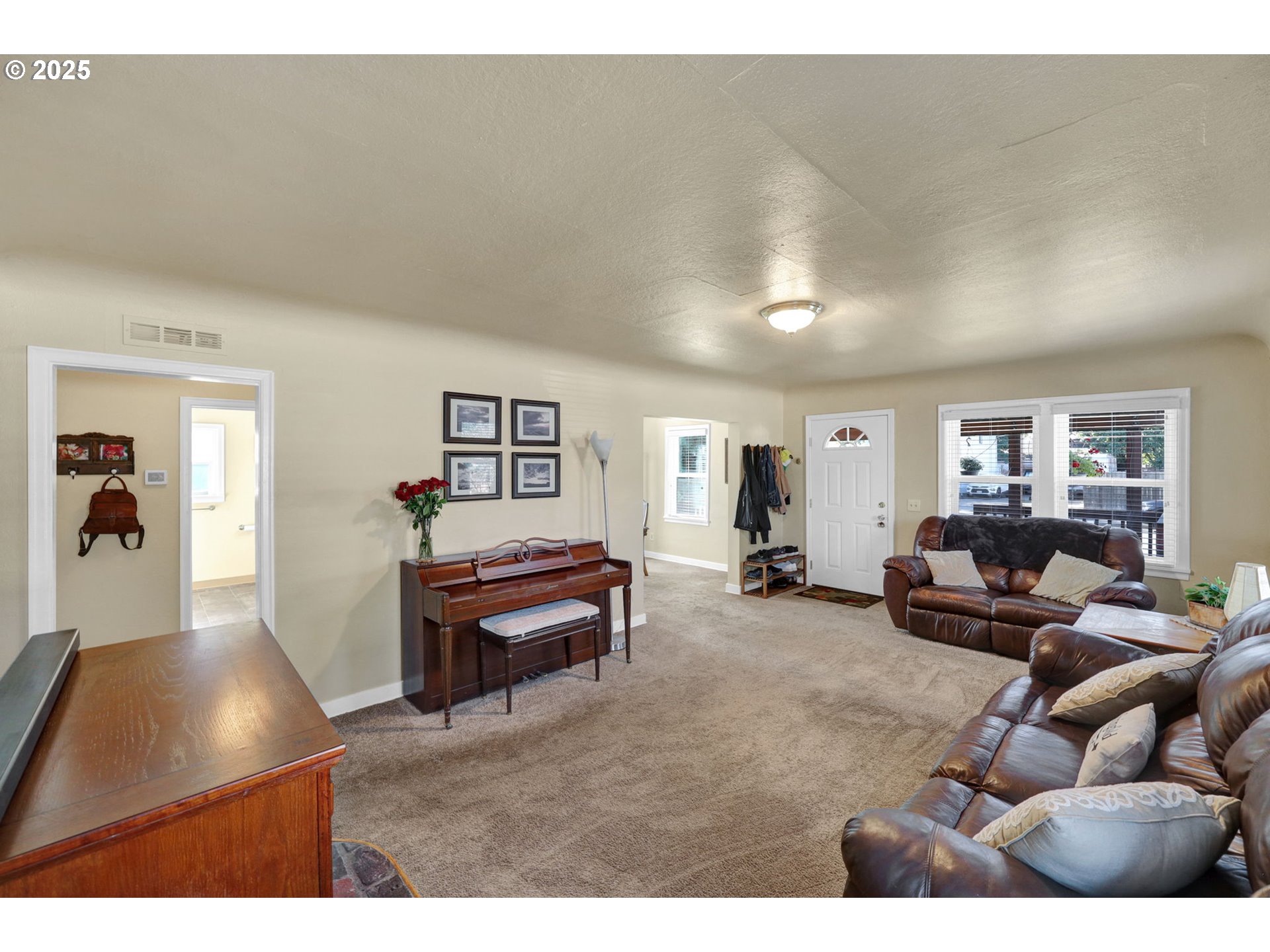 1441 6th Street Springfield, OR 97477 - Photo 7 of 48 a living room with furniture and a flat screen tv