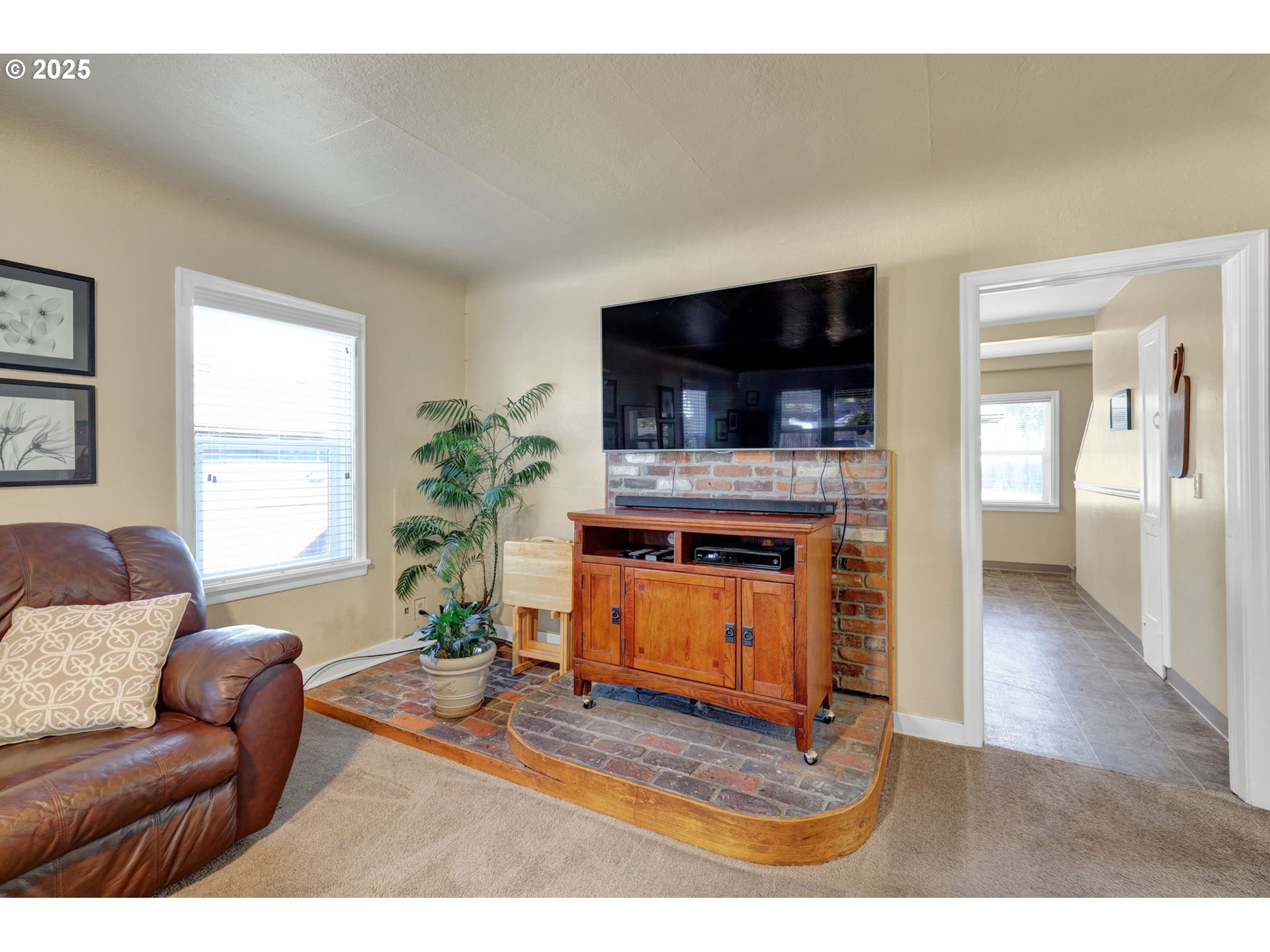 1441 6th Street Springfield, OR 97477 - Photo 9 of 48 a living room with furniture and a flat screen tv
