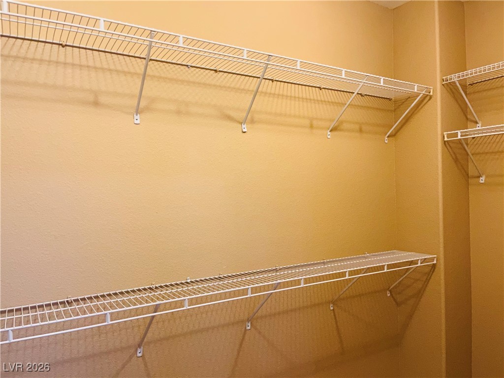 259 Integrity Ridge Drive Henderson, NV 89052 - Photo 21 of 50 Primary bed walk in closet.