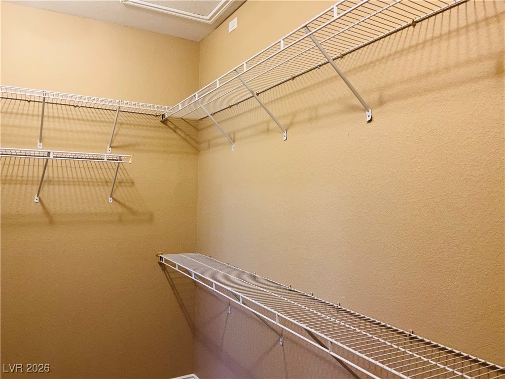 259 Integrity Ridge Drive Henderson, NV 89052 - Photo 22 of 50 Primary bed walk in closet.