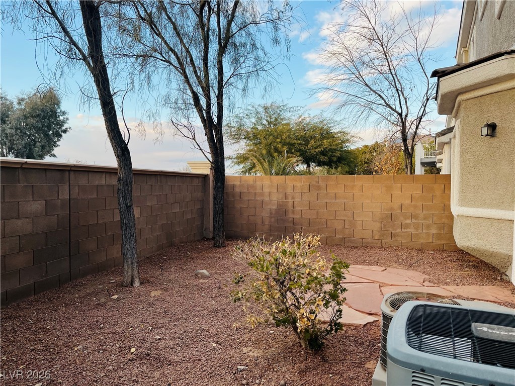 259 Integrity Ridge Drive Henderson, NV 89052 - Photo 47 of 50 Low maintenance backyard w/desert rock landscaping.