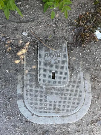 a view of a brick house with a floor to ceiling window