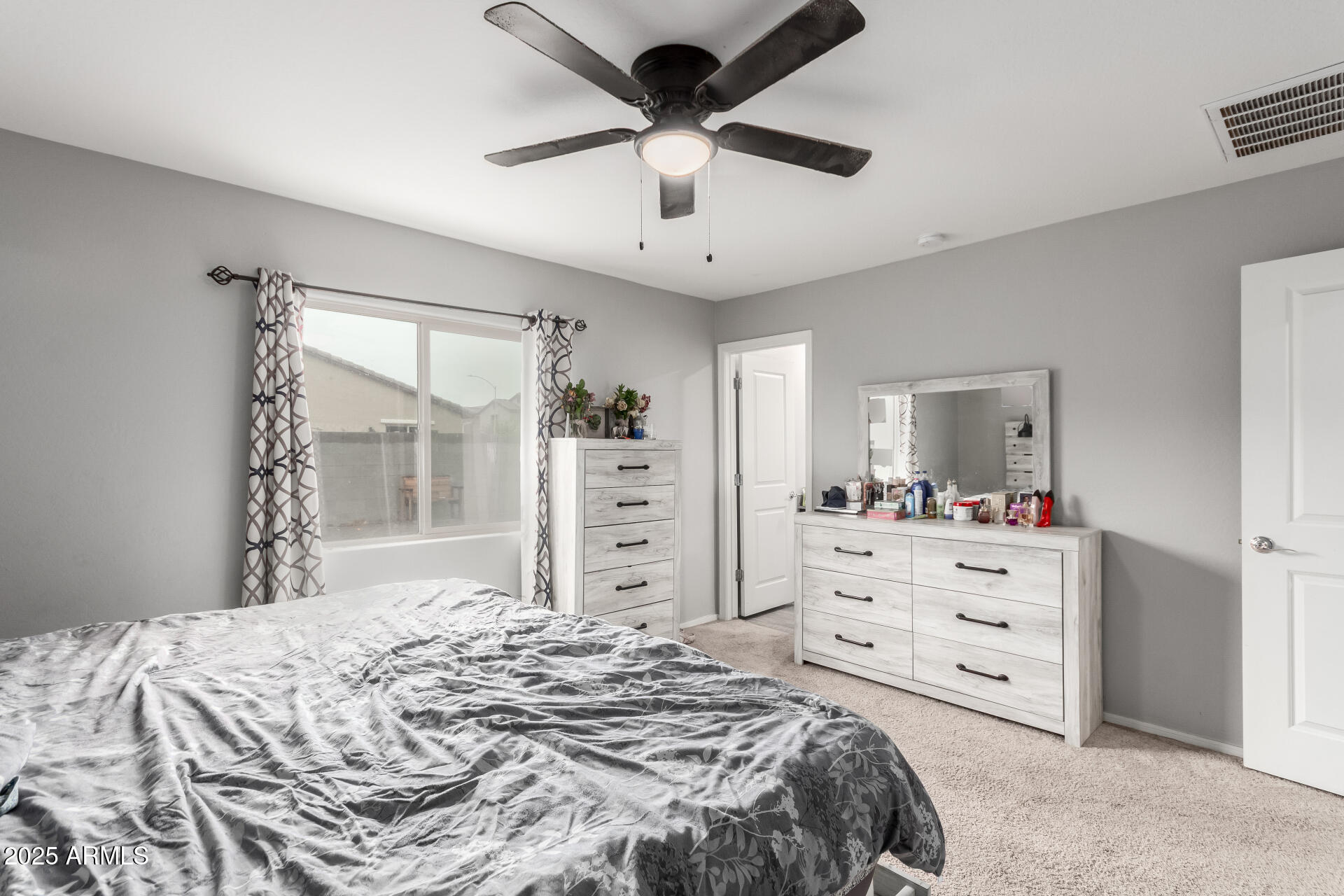 685 West 16th Street Florence, AZ 85132 - Photo 12 of 26 a bedroom with a bed and a window