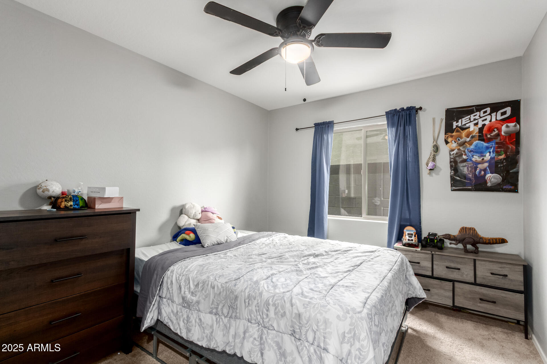 685 West 16th Street Florence, AZ 85132 - Photo 16 of 26 a bed room with a bed and a window