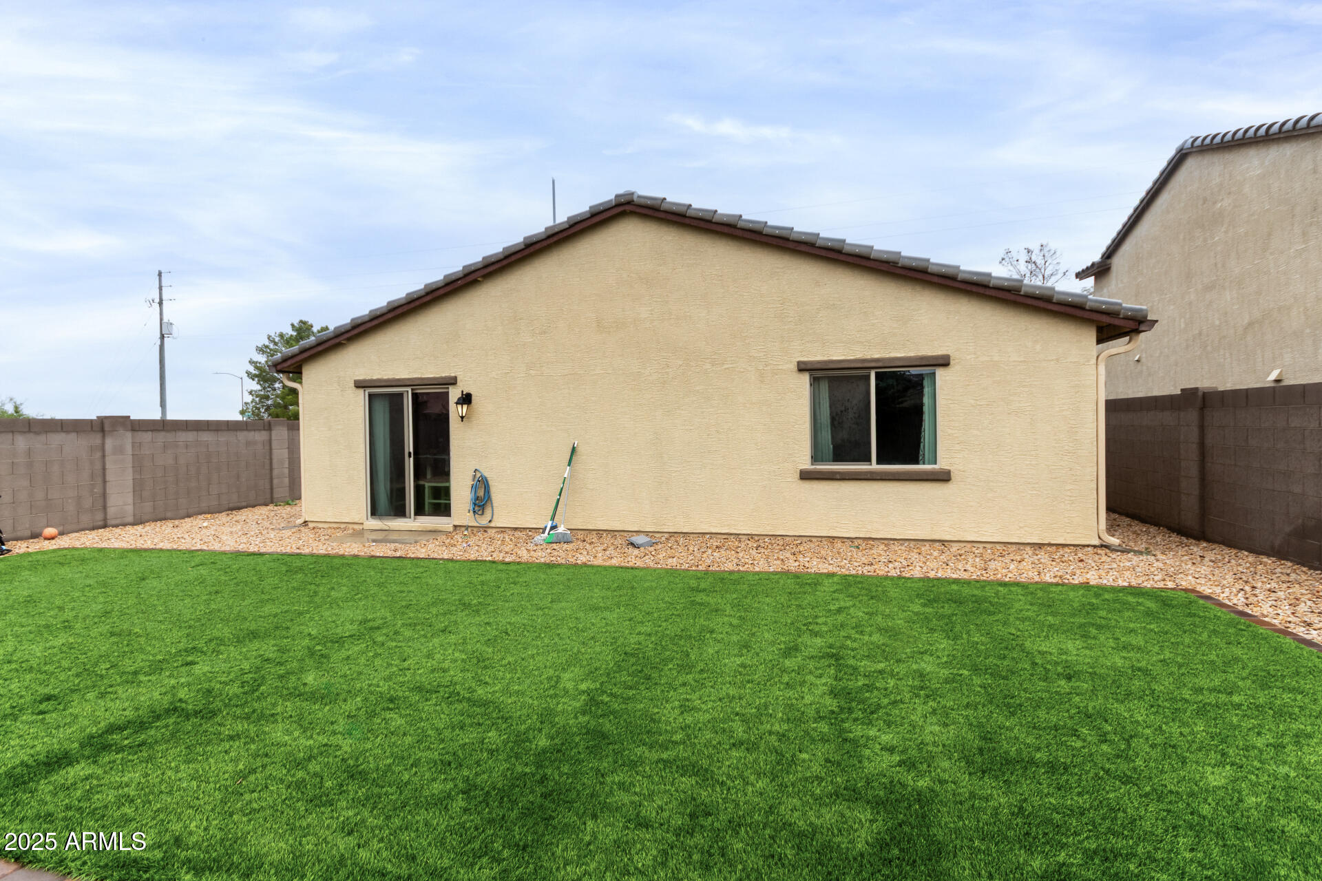 685 West 16th Street Florence, AZ 85132 - Photo 24 of 26 a view of a backyard with plants and a garden