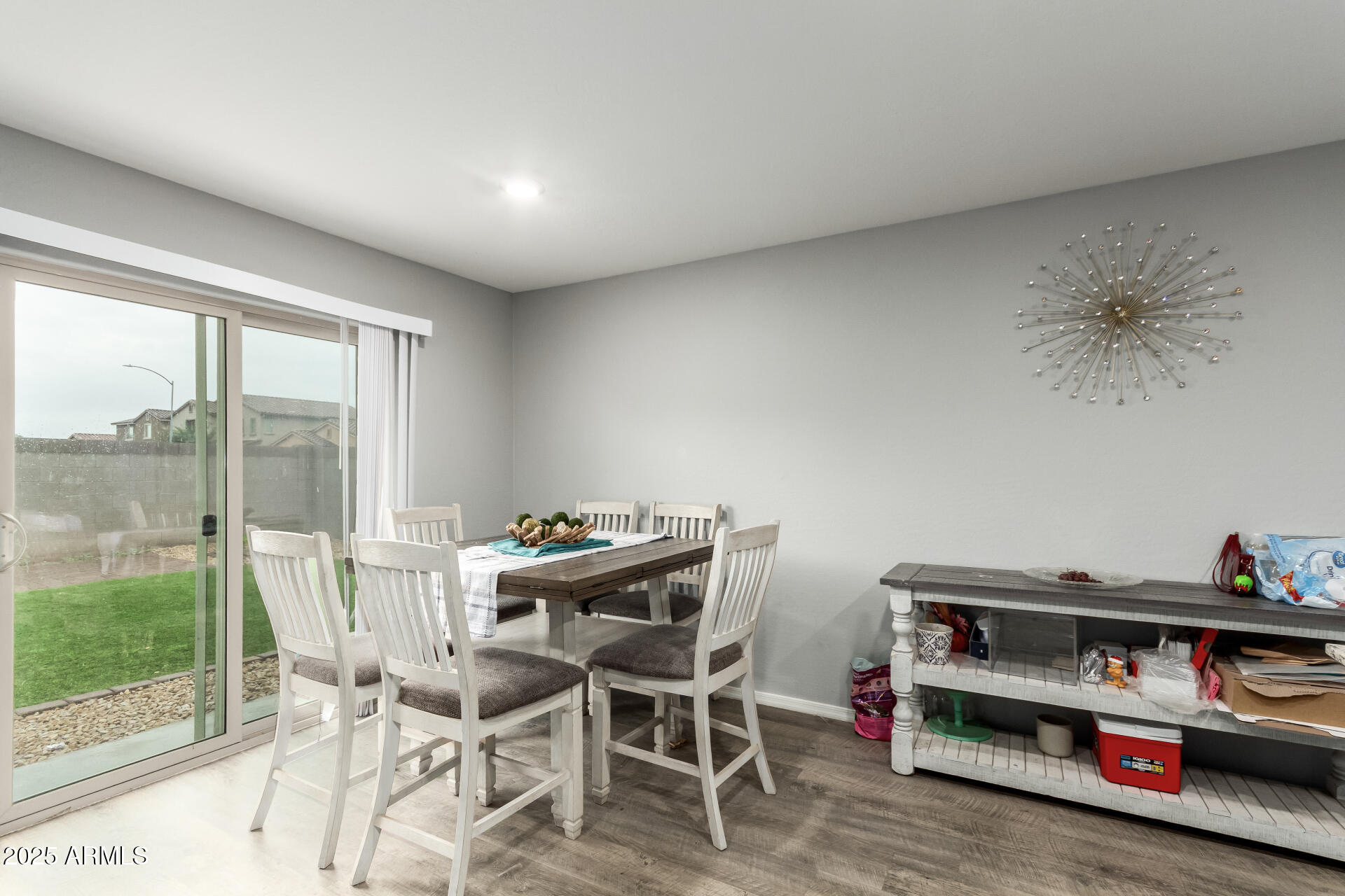 685 West 16th Street Florence, AZ 85132 - Photo 10 of 26 a dining room with furniture and a floor to ceiling window