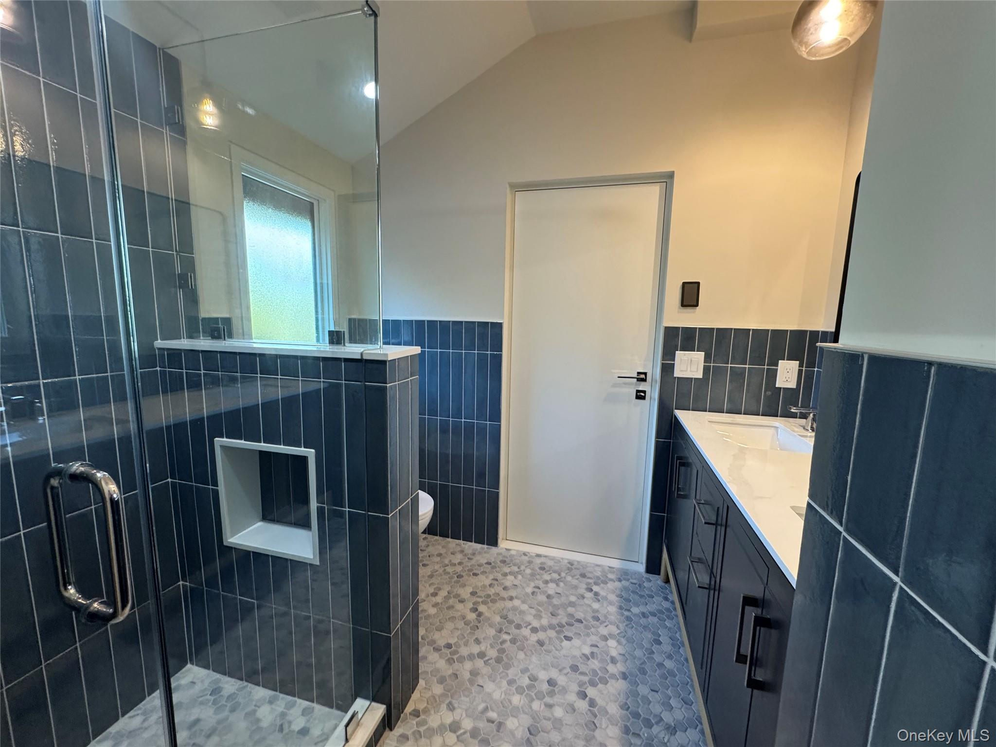 17 Heather Drive Remsenburg, NY 11960 - Photo 26 of 37 a bathroom with a sink and mirror