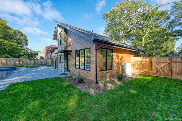 a view of a backyard with a small pool