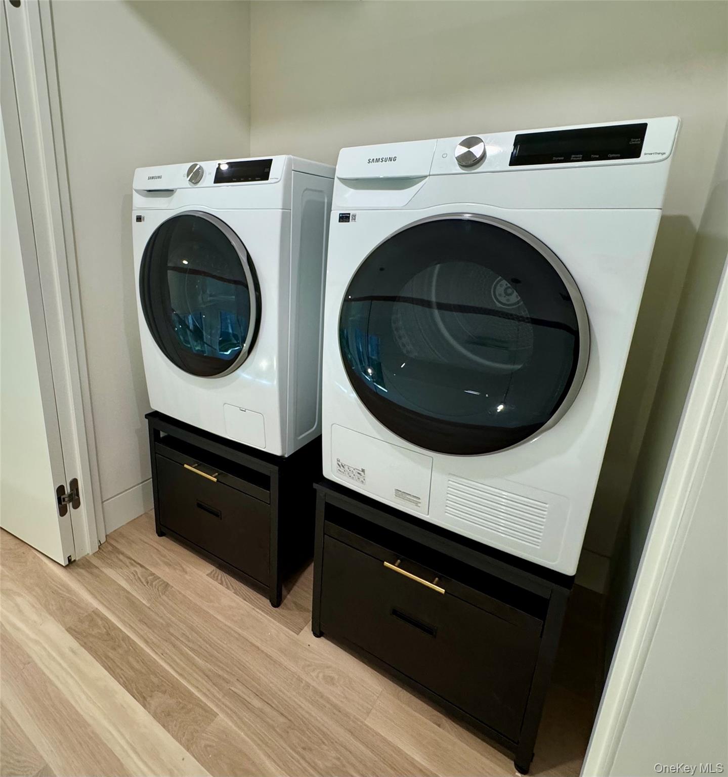 17 Heather Drive Remsenburg, NY 11960 - Photo 27 of 37 a room with a washer and dryer