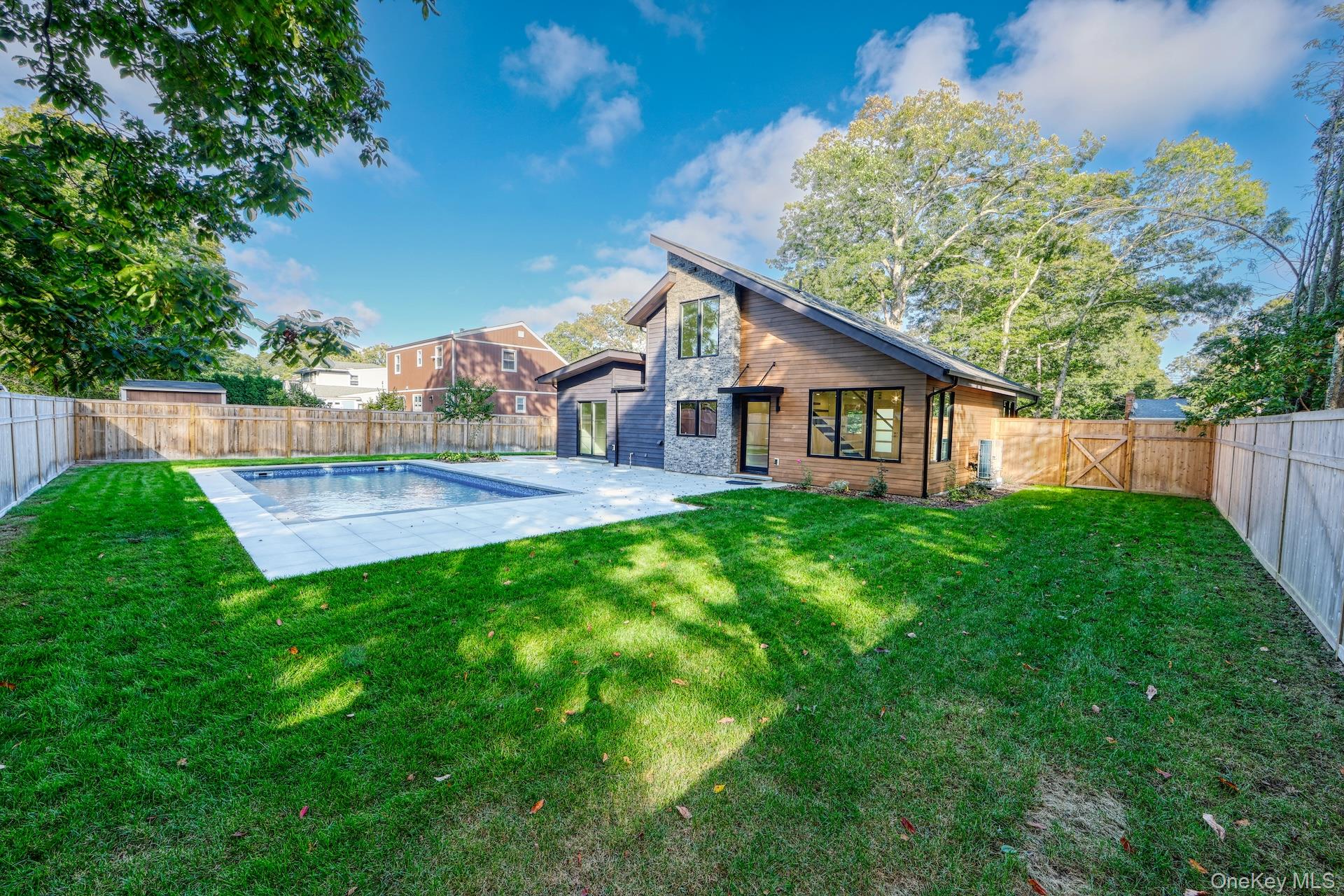 17 Heather Drive Remsenburg, NY 11960 - Photo 30 of 37 a view of a house with a yard