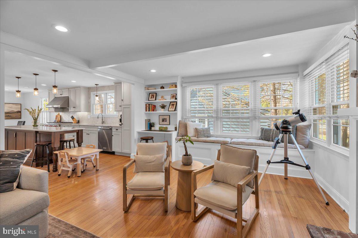 126 Ashford Road Cherry Hill, NJ 08003 - Photo 15 of 43 a living room with furniture wooden floor and a large window