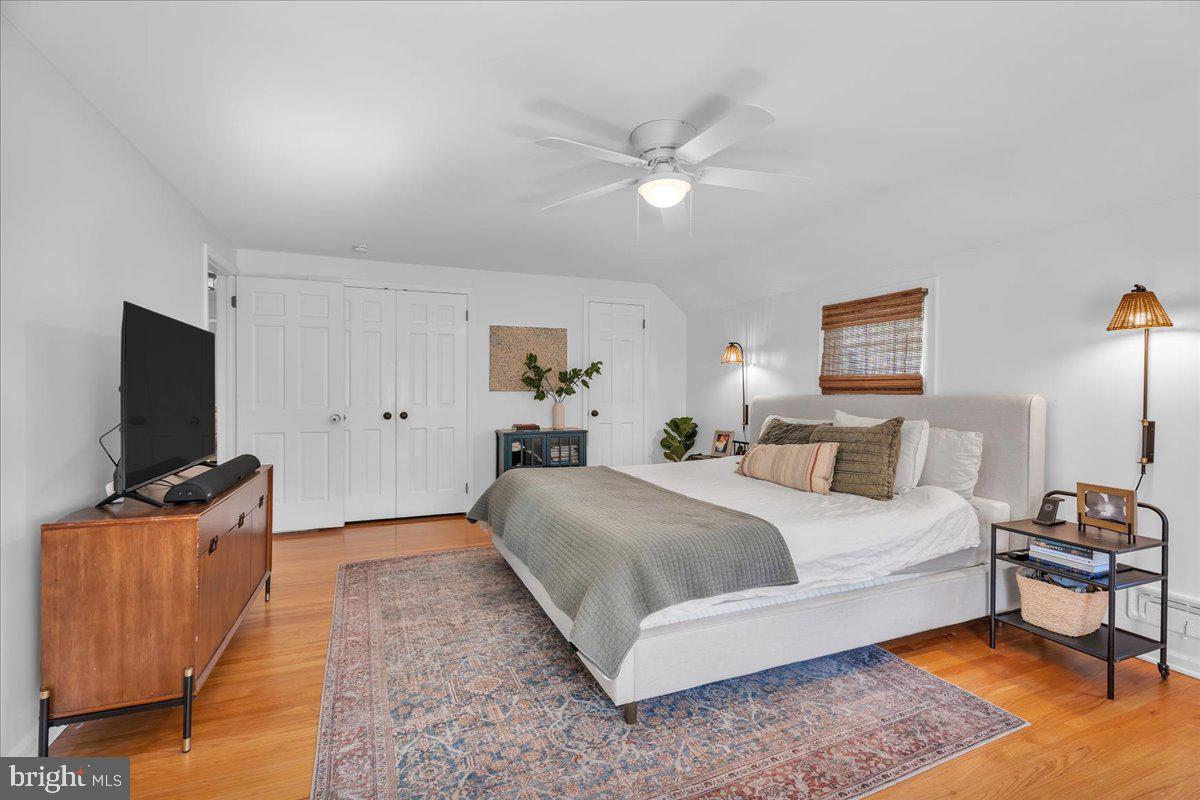 126 Ashford Road Cherry Hill, NJ 08003 - Photo 19 of 43 a bedroom with a bed and a flat screen tv
