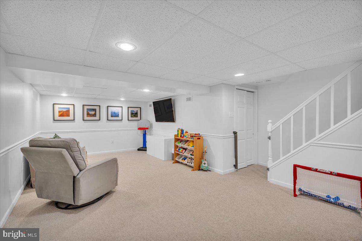 126 Ashford Road Cherry Hill, NJ 08003 - Photo 29 of 43 a living room with furniture and a table