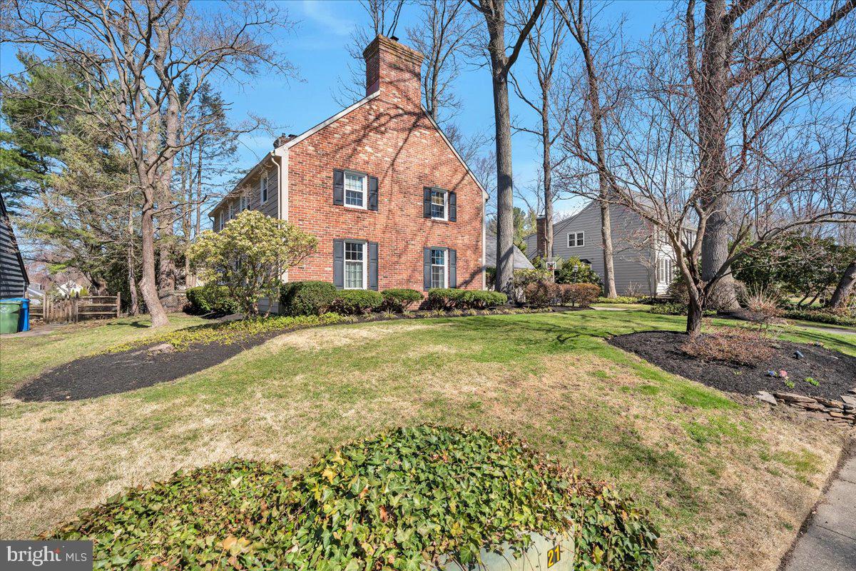126 Ashford Road Cherry Hill, NJ 08003 - Photo 3 of 43 a view of a building with a yard