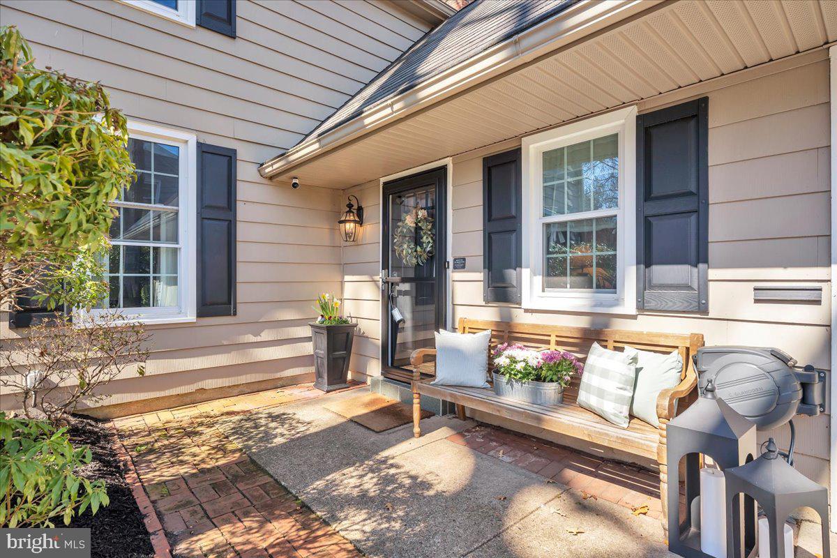 126 Ashford Road Cherry Hill, NJ 08003 - Photo 4 of 43 a view of a chairs and table in the patio