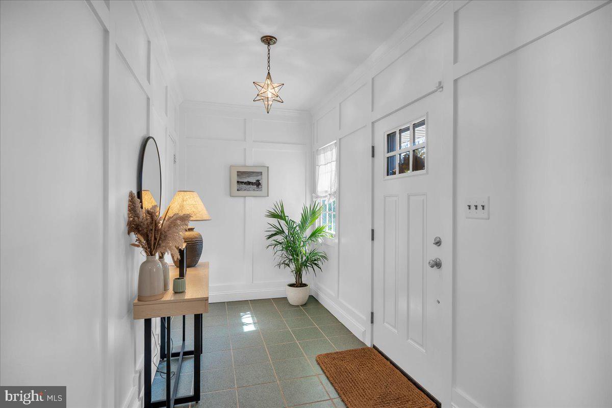 126 Ashford Road Cherry Hill, NJ 08003 - Photo 5 of 43 a view of an entryway with wooden floor