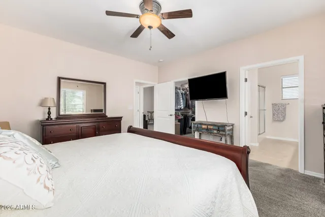 a bathroom with 2 sink and a mirror