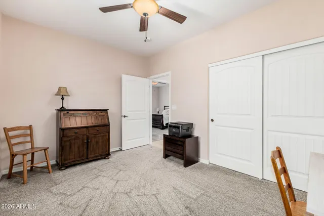 a bathroom with a toilet sink and shower