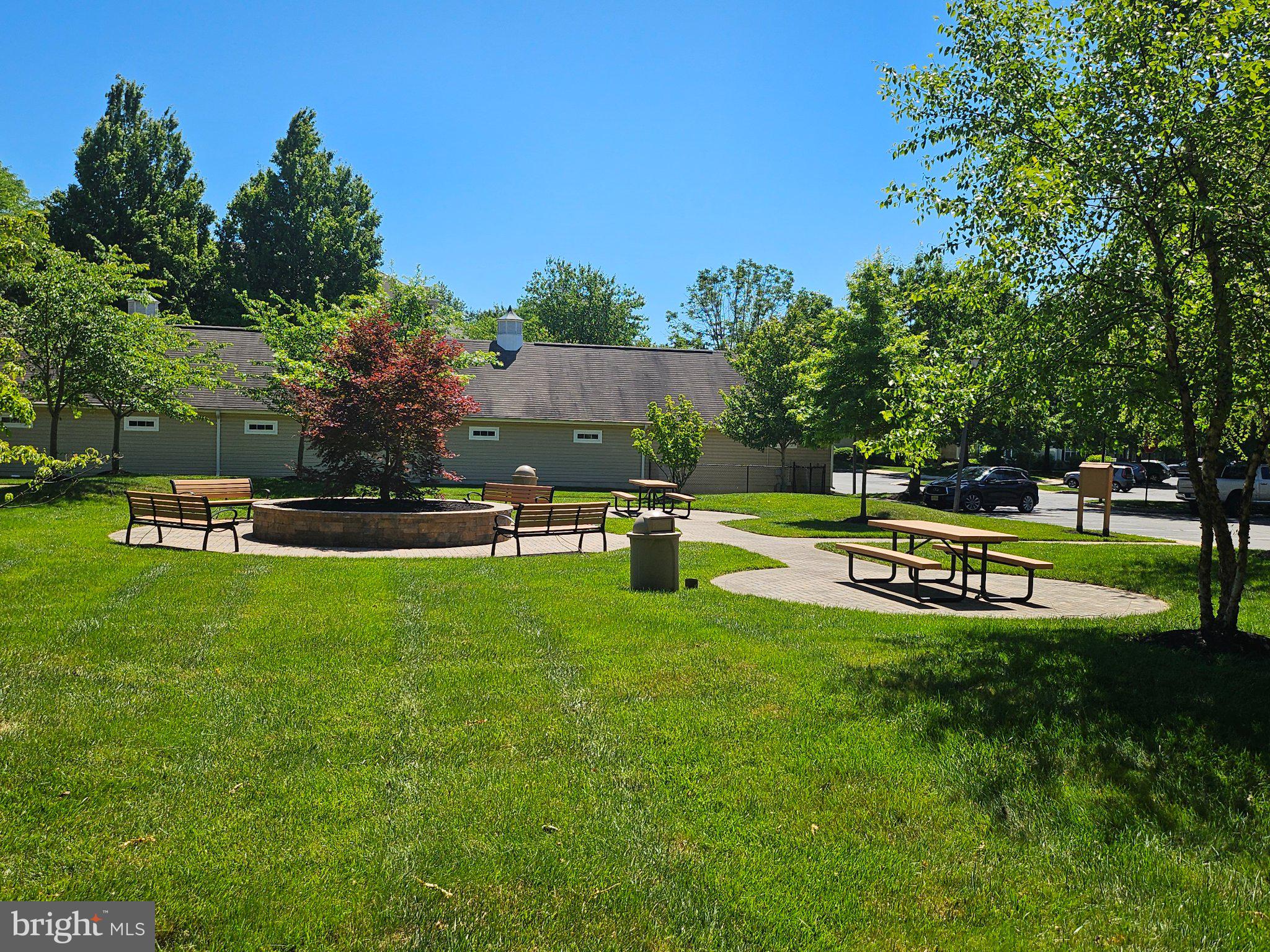 83 Kyle Way Ewing, NJ 08628 - Photo 36 of 36 Serene park retreat with lush greenery.