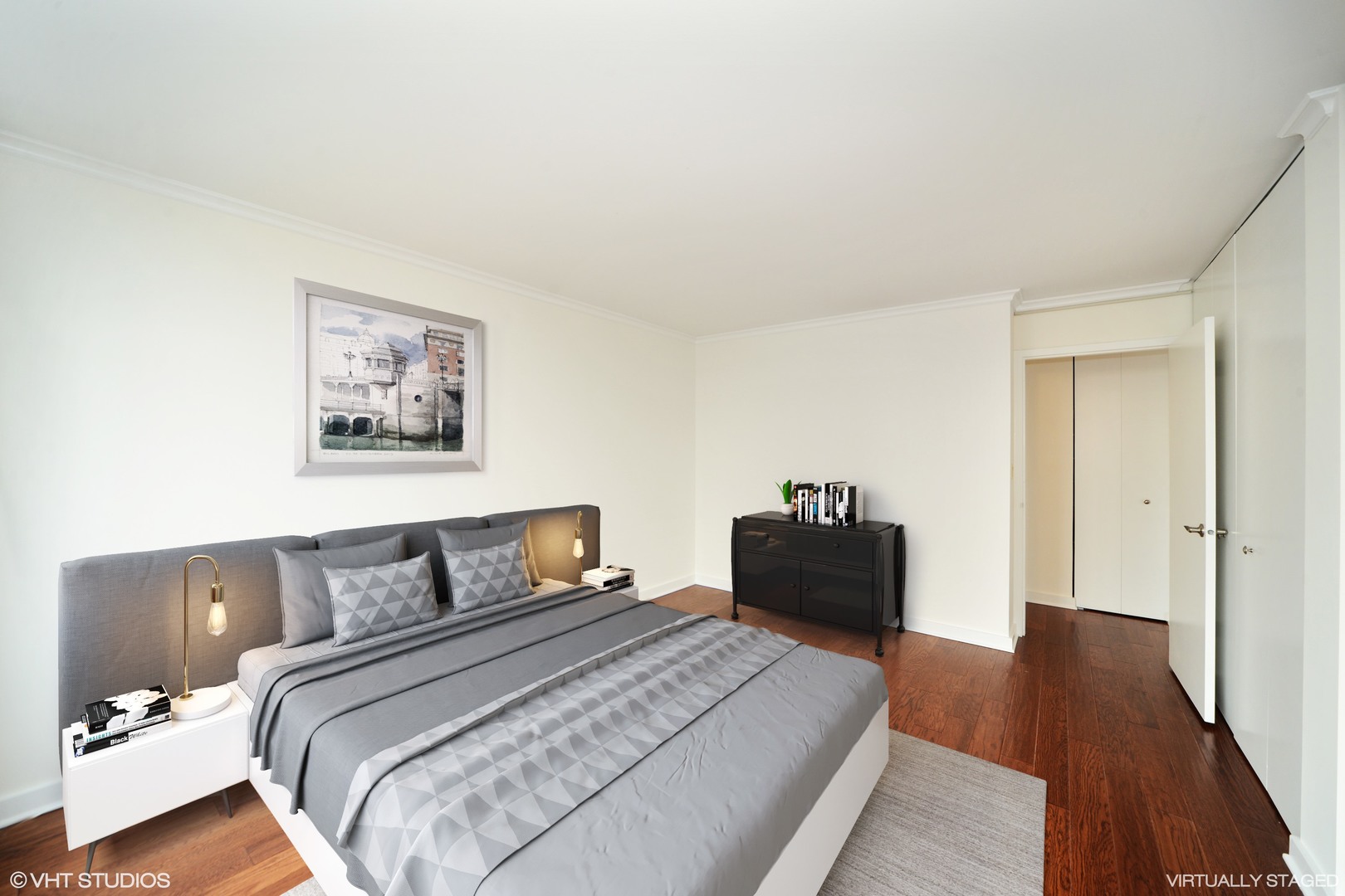 5455 North Sheridan Road, Unit 2810 Chicago, IL 60640 - Photo 6 of 9 a bedroom with bed and wooden floor