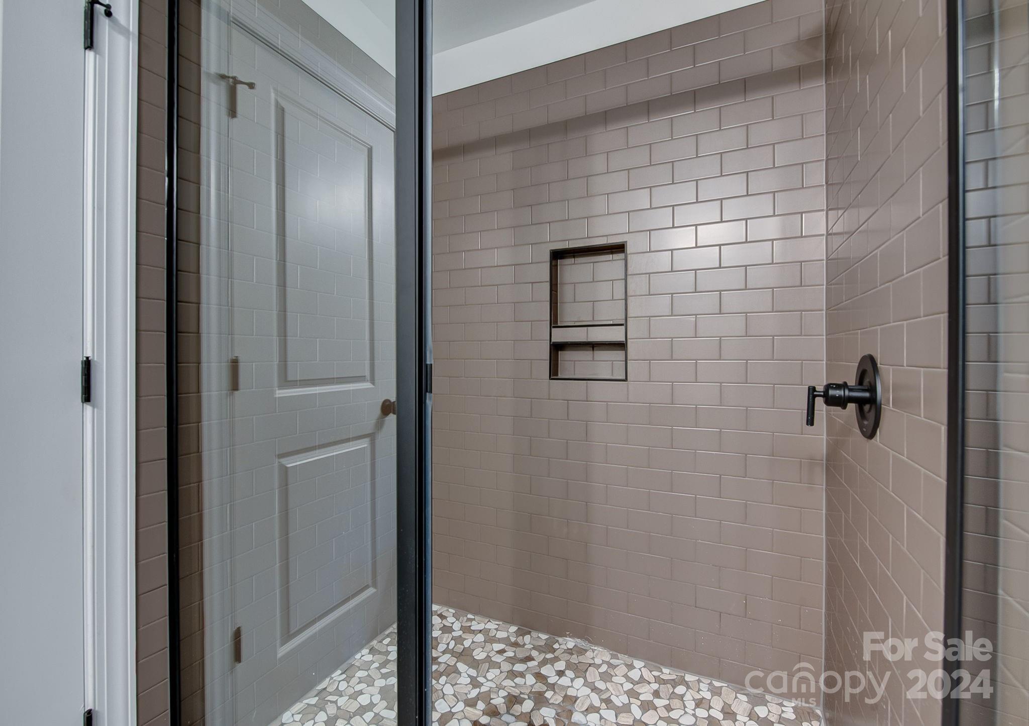525 Blacksnake Road Stanley, NC 28164 - Photo 13 of 21 a bathroom with a shower
