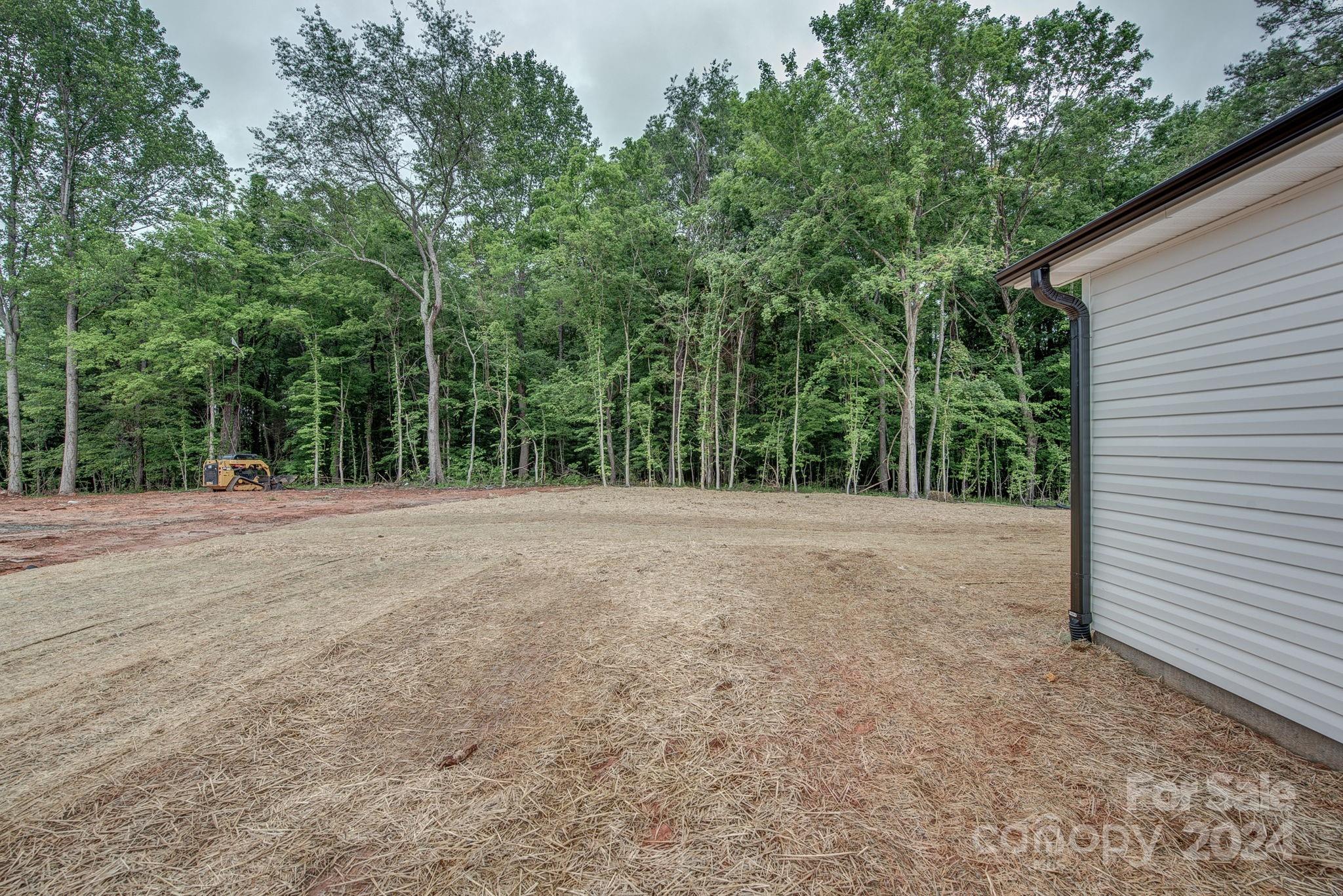 525 Blacksnake Road Stanley, NC 28164 - Photo 20 of 21 a view of outdoor space and yard